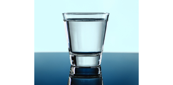 Glass of water on desk