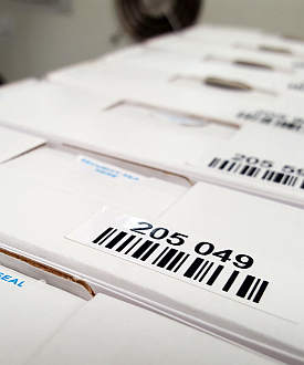 Envelopes with a tracking number used to manage water testing results