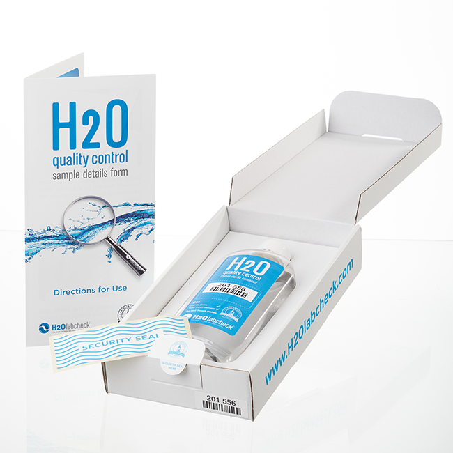 H2Olabcheck water testing kit opened: sampling bottle, directions to use inside